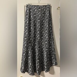 Black and white flowered long flowy skirt. Size small and barely worn.